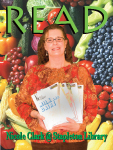 Dr. Clark holding her books