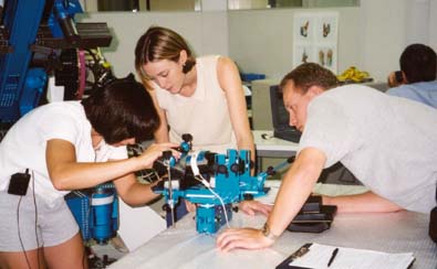 Patty with MARES (Muscle Atrophy Research Excercise System) development team evaluating ISS hardware.  Barcelona, 6/00.