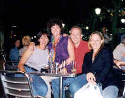 Patty along with astronaut Laural B. Clark, astronaut Bill Shepherd and his wife in Spain.