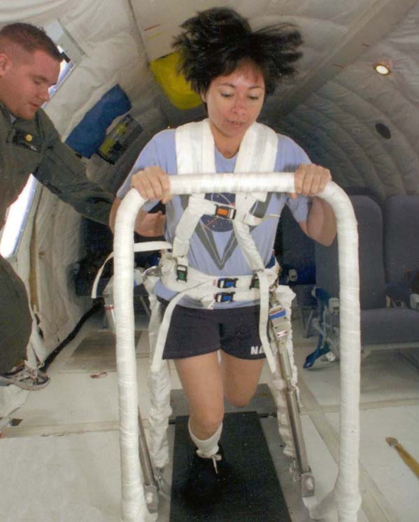 Patty exercising in the weightlessness similator at Johnson Space Center in Houston.
