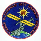 International Space Station temporary tattoo:Bloomfield, Garneau, Jett, Noriega, Tanner.